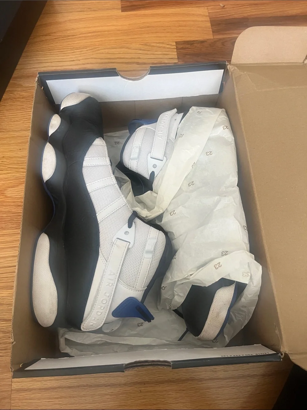 Jordan Retro High-Top Sneakers in Black, White & Blue